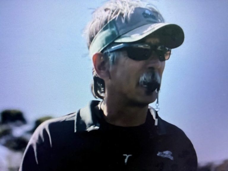 Man charged in killing of ‘Last Chance U’ coach John Beam