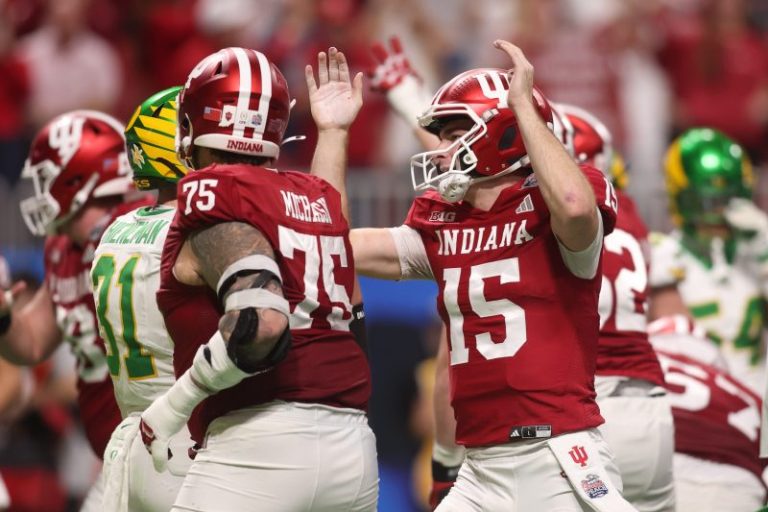 Who is favorite in national championship game, Indiana or Miami?