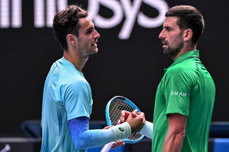 Djokovic reaches Aussie Open semis after injury to opponent